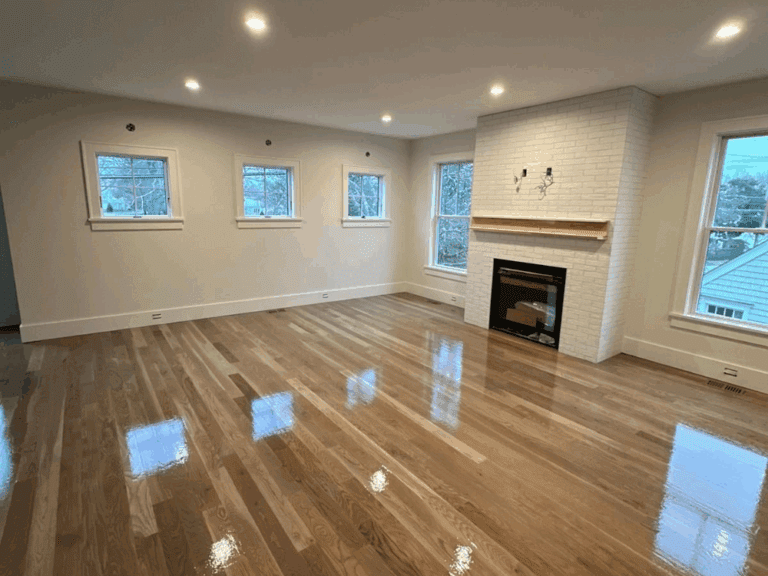 Flooring refinishing with Bona Traffic High Gloss showcasing a beautifully restored living room with shiny hardwood floors and modern finishes.Flooring refinishing with Bona Traffic High Gloss showcasing a beautifully restored living room with shiny hardwood floors and modern finishes.