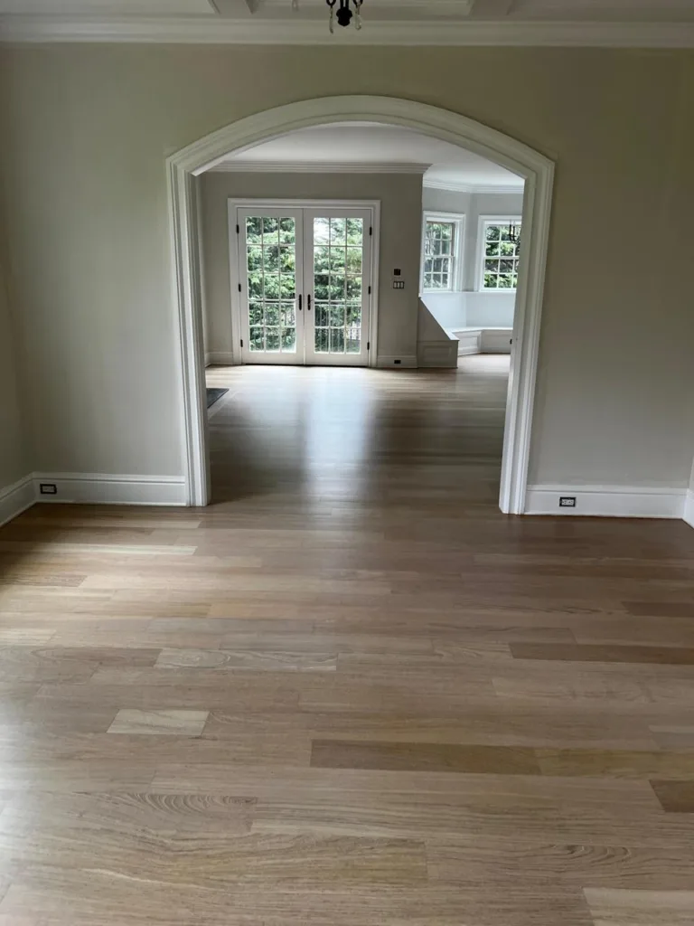 Hardwood flooring repair service in progress by Tri-State Hardwood Flooring.