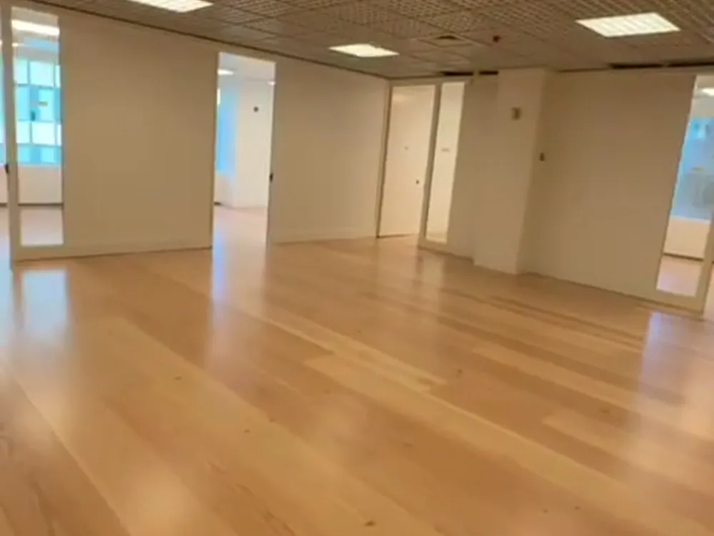 Bona Mega One floor refinishing process in a modern office space