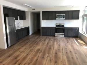 Vinyl Flooring Repair Service by Tri-State Hardwood Flooring in a modern kitchen