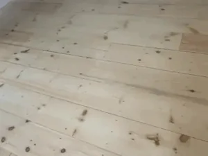 Install 7” unfinished Eastern White Pine flooring with cut nails – Ridgefield CT