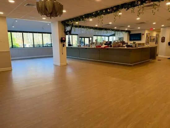 Wide interior view of the main floor area after completion of the Testos Restaurant floor installation.